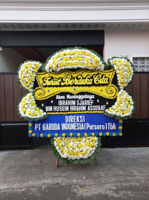 Papan Bunga Duka di Gunung Woka